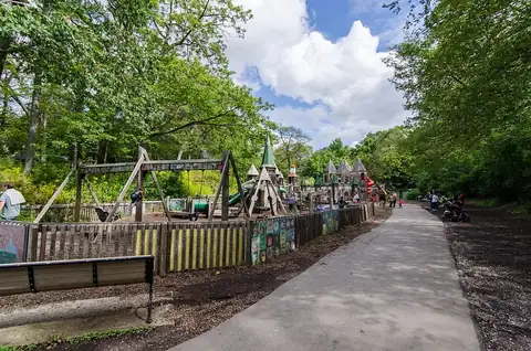 Wooden castle play structures at Jamie Bell Adventure Playground in High Park